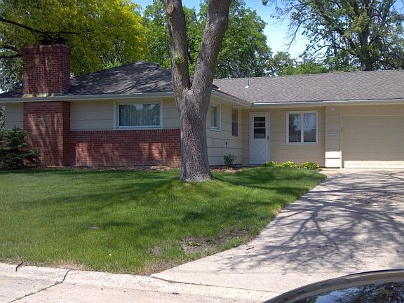 double car attached garage, with mudroom off of kitchen