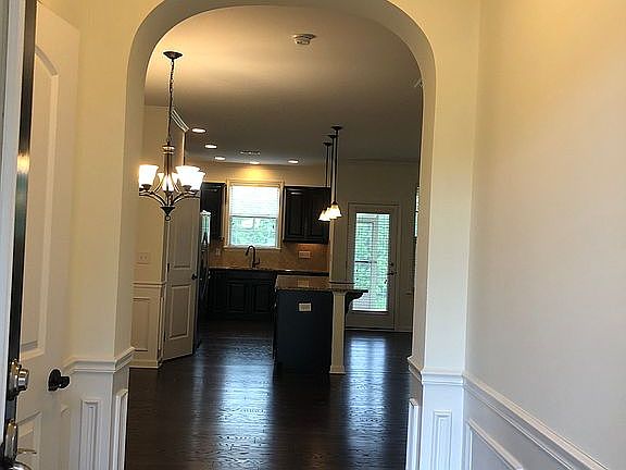 Entryway with hardwood floor