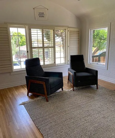 Living room and beautiful windows letting the natural light in