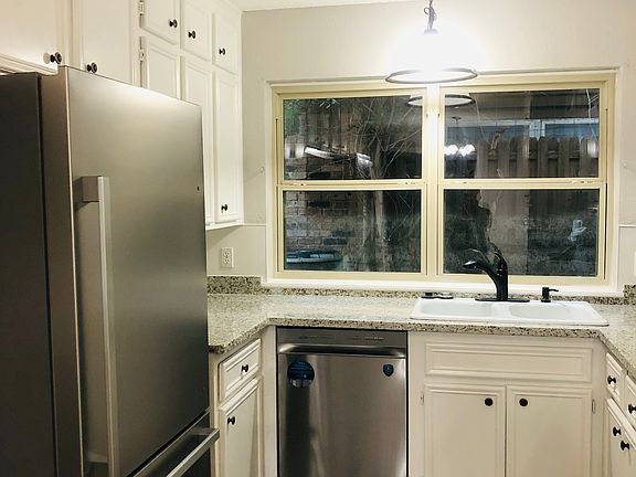 Brand new stainless steel appliances and granite kitchen.