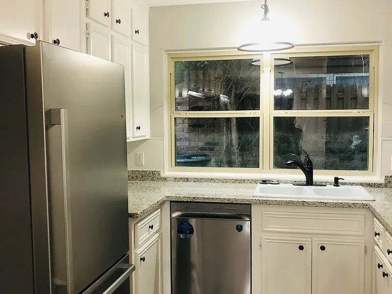 Brand new stainless steel appliances and granite kitchen.