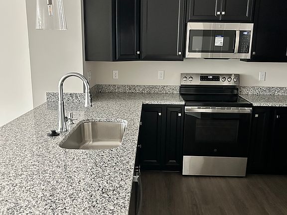 Brand new GE stainless steel appliances.