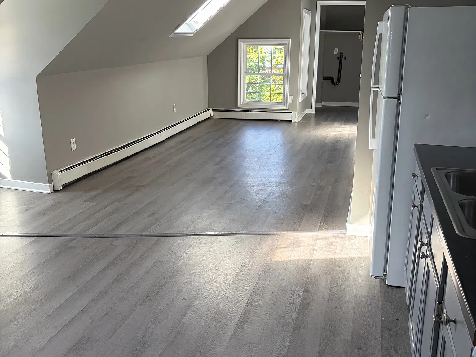 2BR Third-Floor Apartment, Heat Included Available Now — Photo 3