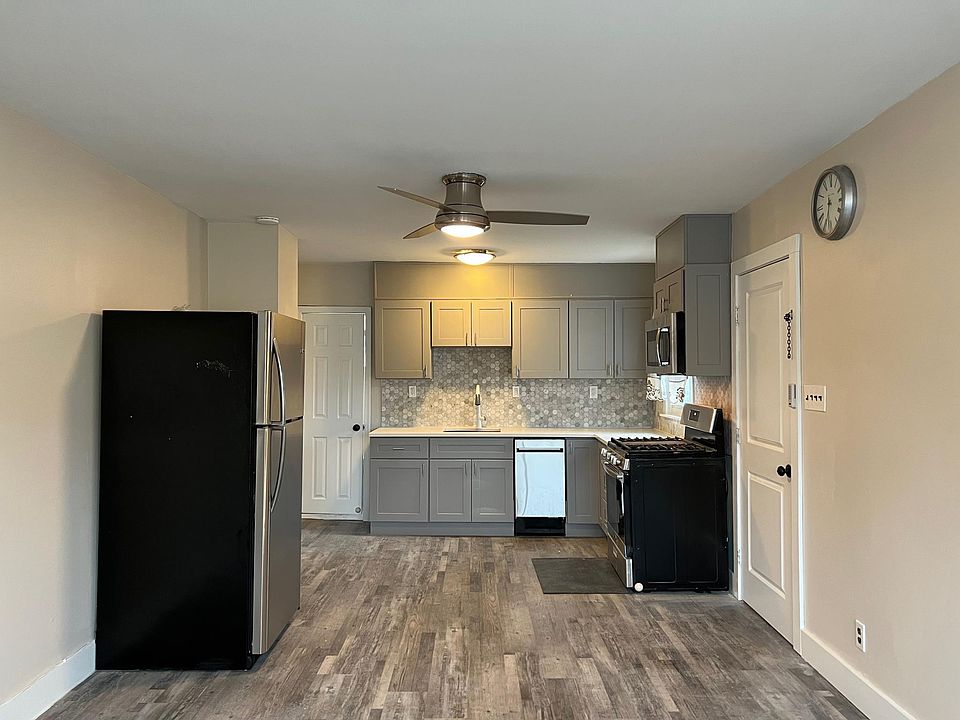 Open concept living room, dining room, kitchen