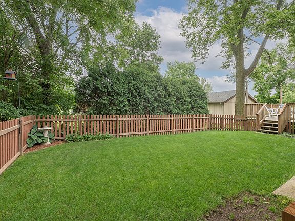 The play yard has access to the deck, to the garage, or to the front yard!