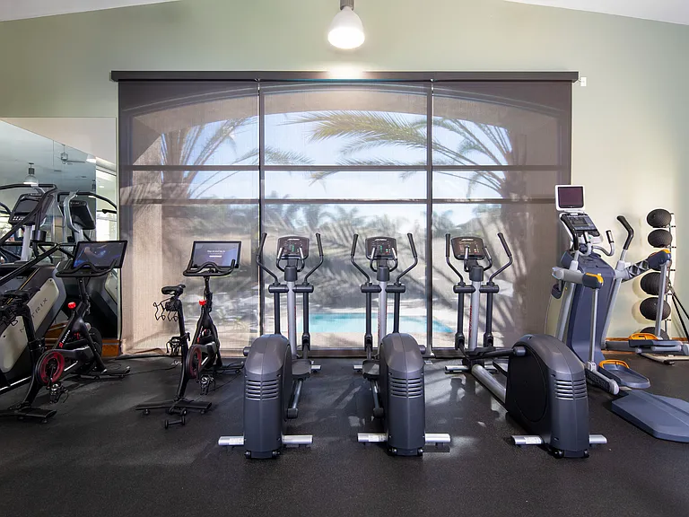 Cardio with a view of the pool! Peloton bikes with pre paid memberships.
