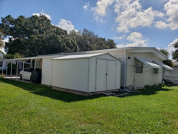 Rear view with storage shed