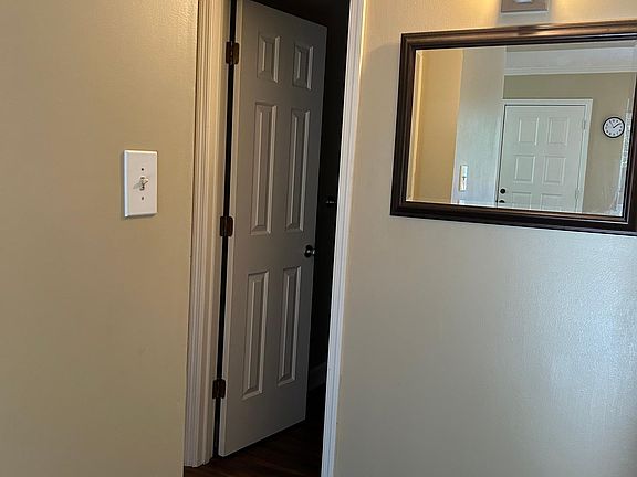 hallway with attic storage