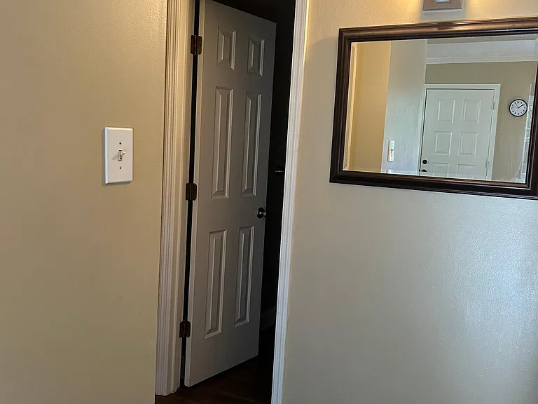 hallway with attic storage