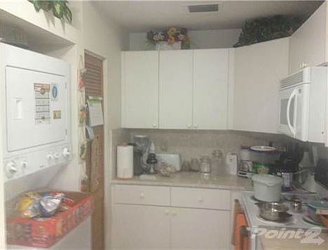 Kitchen. Plus wash and dryer inside the unit
