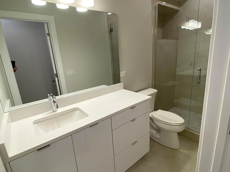 Duplex Down Bathroom with Walk - in Shower