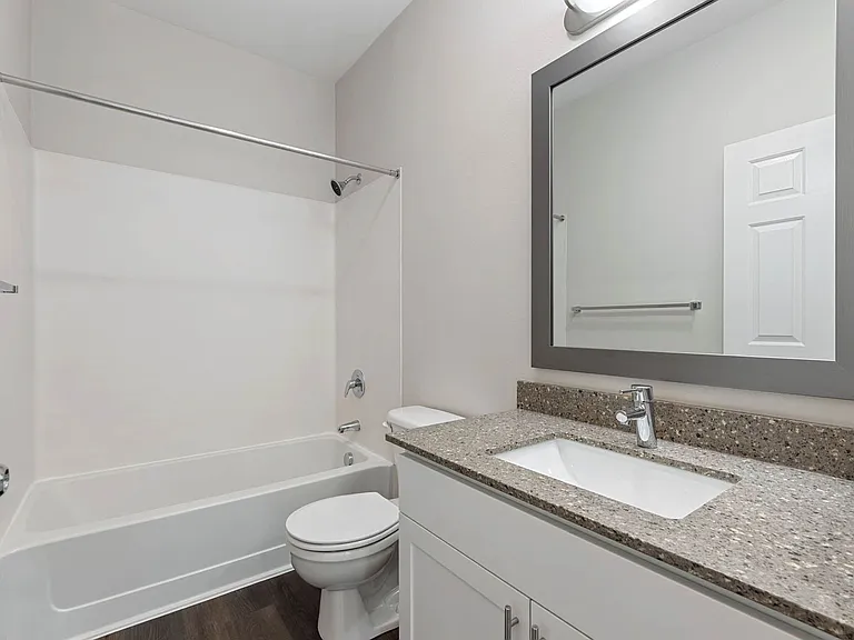 Spacious en-suite bath with double sinks in select homes.