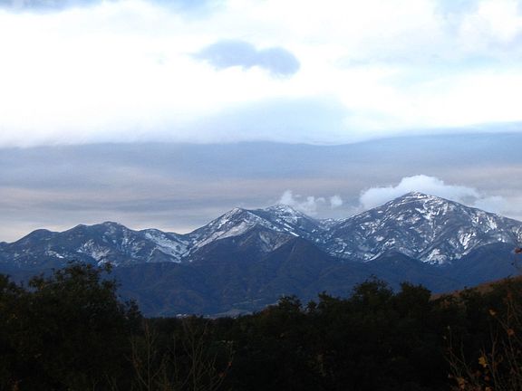 Backyard view of Saddleback Mountain in winter