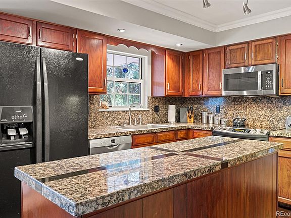 5th image of 7191 S Olive Way