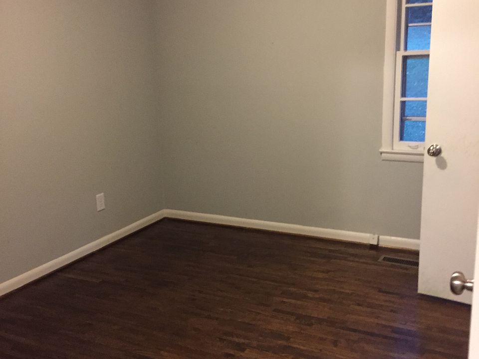 Den with sand and finish oak floors