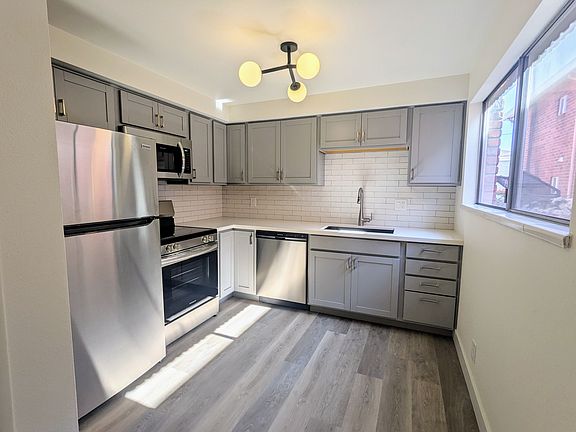 Beautiful Kitchen Featuring All New Appliances, Cabinets, and Counter Tops