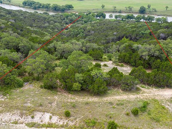 (Lines marking property lines are fairly accurate but not precise.) This is the front of the property looking all the way down to the river. Come take a look at the neighborhood. You will fall in love!