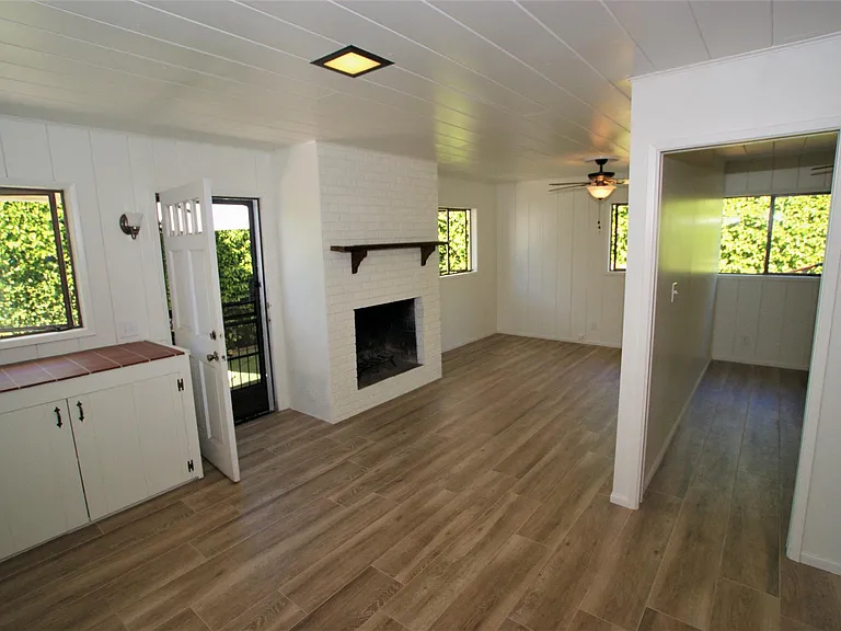 Bright living room, fireplace area