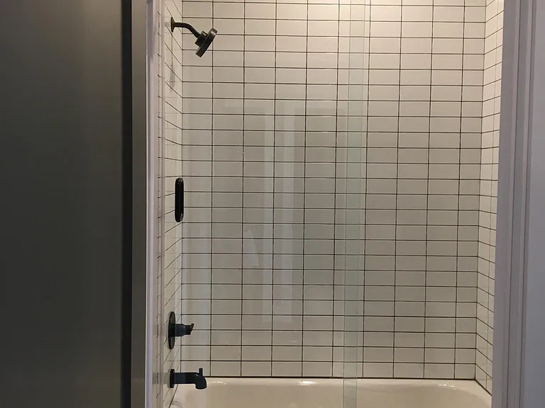 Shower and toilet have their own door that shuts off the adjacent room with bathroom sinks - helpful for when multiple people are getting ready.