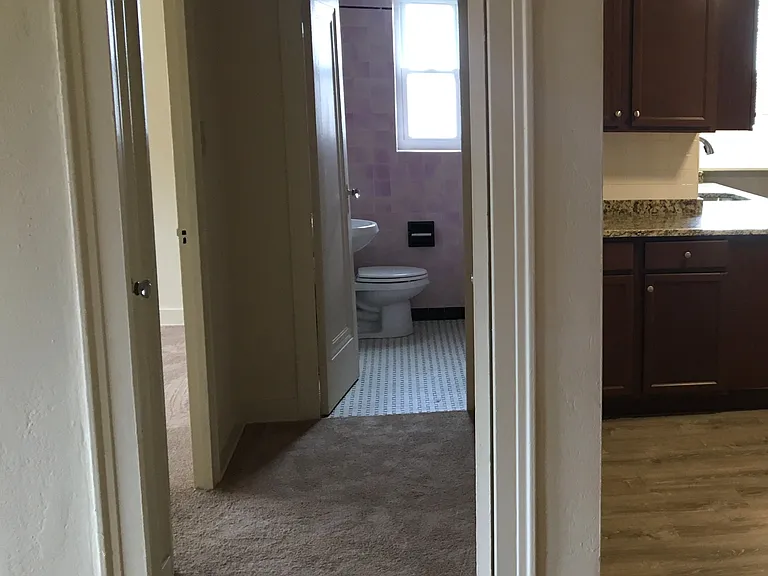 Hallway to bedroom and bathroom