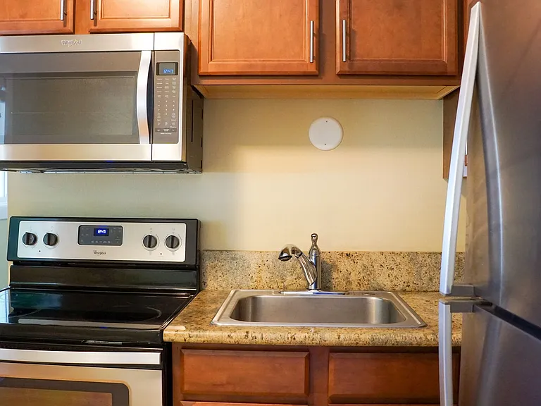 Top-Floor 2-Bedroom with Bamboo Flooring + Off-Street Parking! — Photo 1