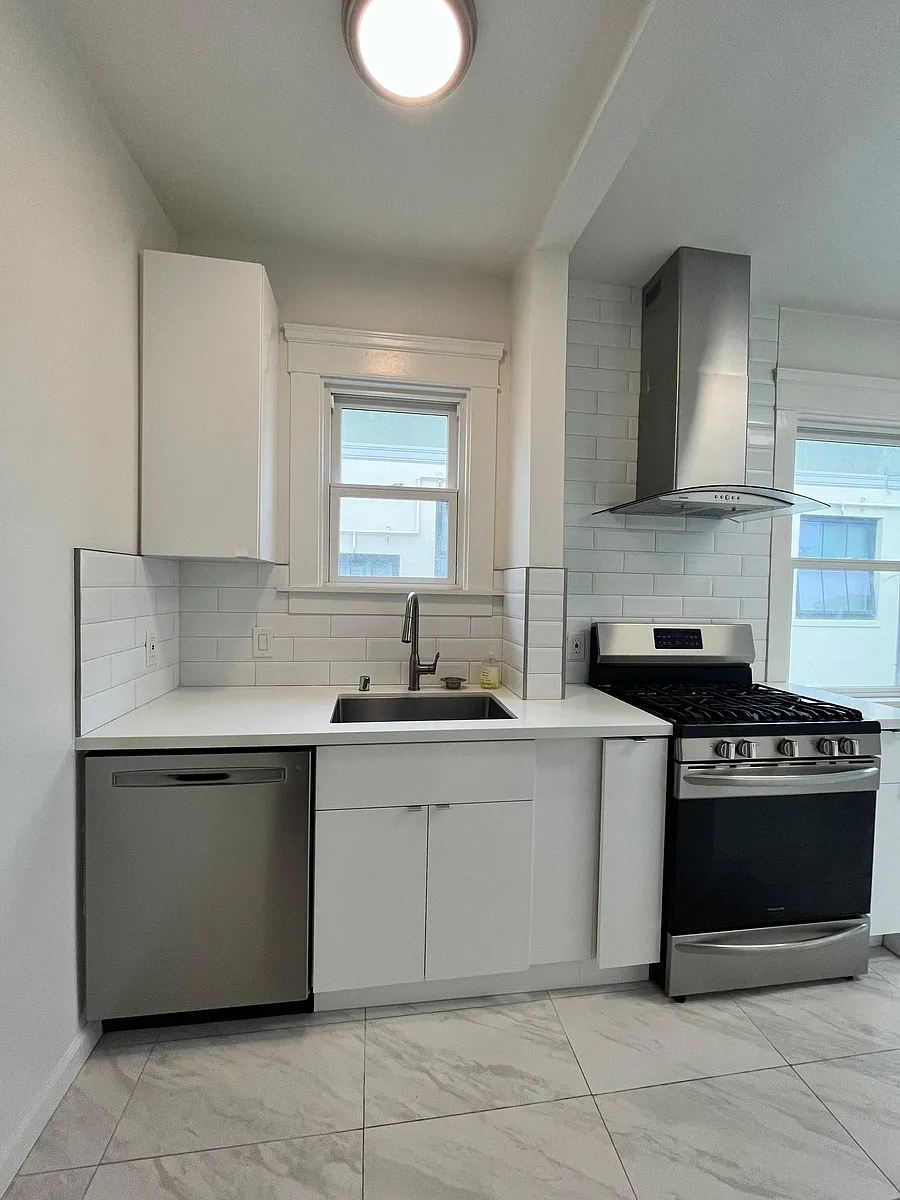 Completely updated and huge kitchen. Stainless Steel appliances, tile floors, granite counters. Great natural light as well. - 312 Francisco St