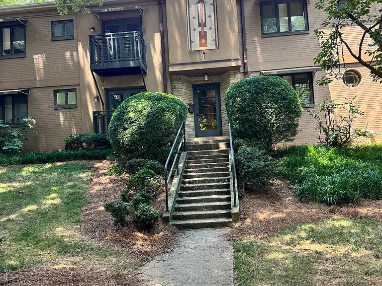 Entrance to building D. The unit for rent is the top right.