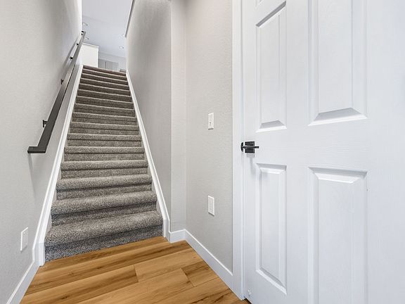 Entryway is off the street and you have a closet with 16 stairs up to the main living space