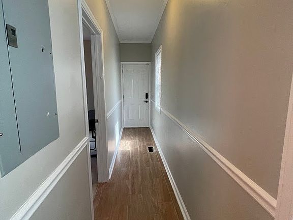 Hallway to rear patio off this room