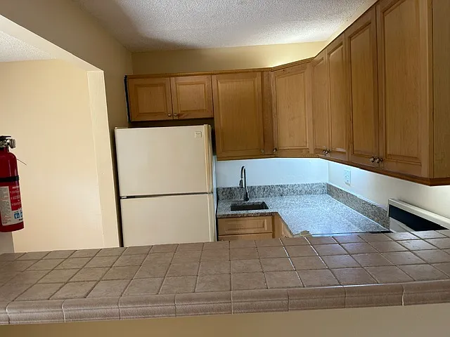 Kitchen with breakfast bar.