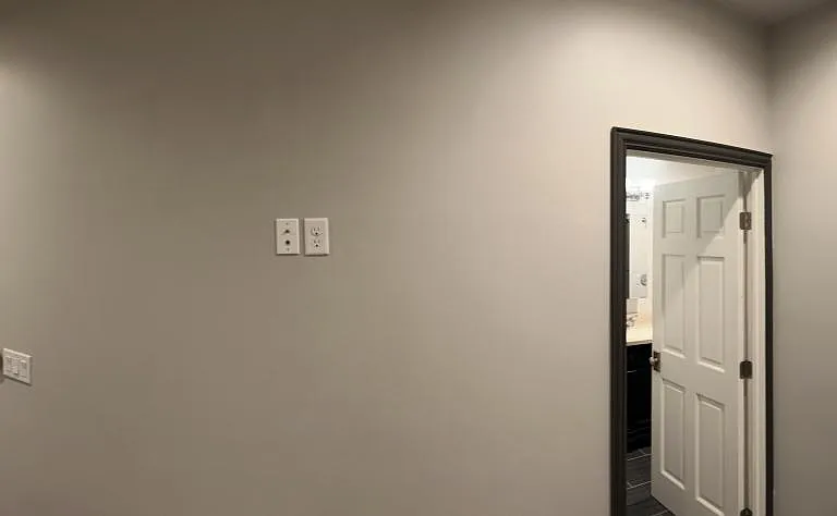 Master Bedroom. Door on right is closet. Door to the left is for ensuite bathroom.