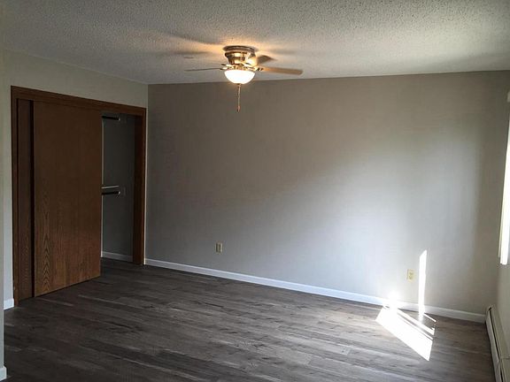 2 separate windows light up the huge bedroom.