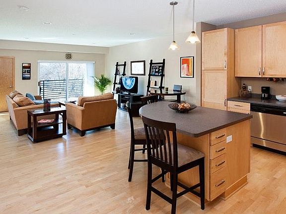 Wide open, expansive living area creates an airy feel and long sight lines. Huge living room measures over 19' wide x 16'.