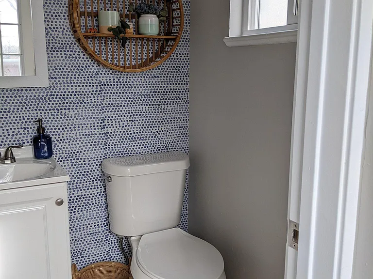 Half bathroom off of the kitchen