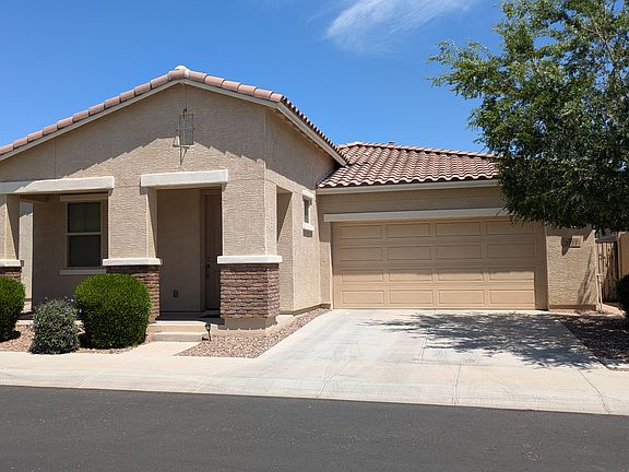 Home with 2 car garage in gated community