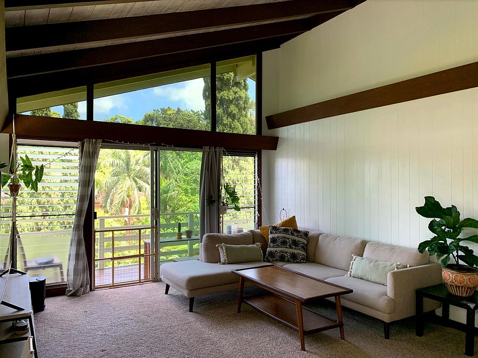 Living room with Island Cooling Fans. Balcony beyond. (unfurnished)