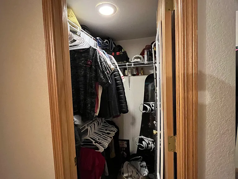 Storage hall closet end of hallway