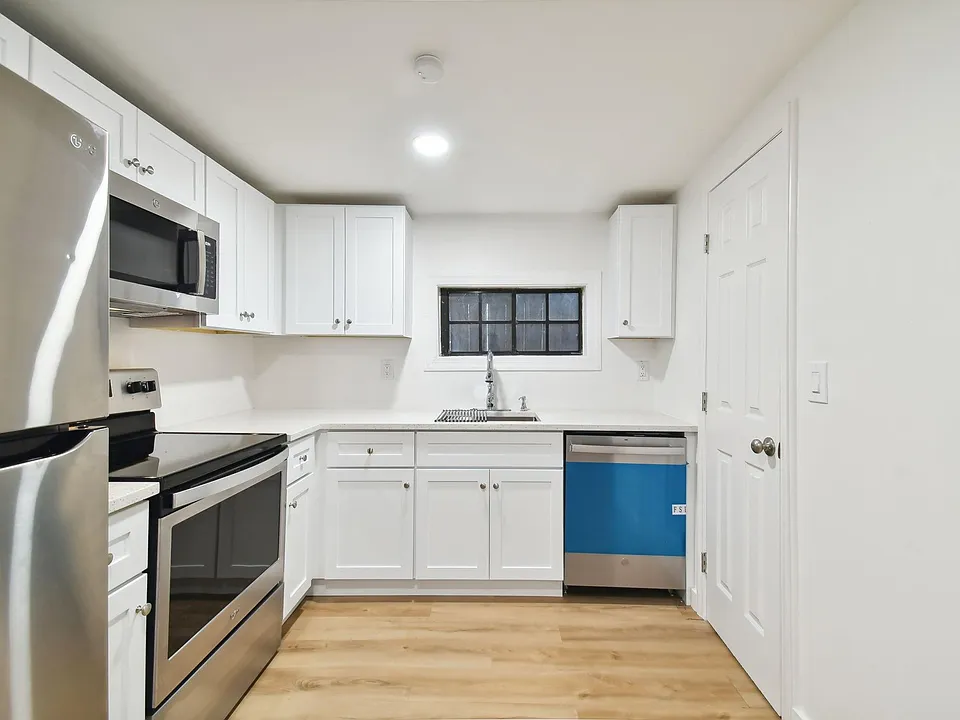 215 S Howard Ave #1/2
