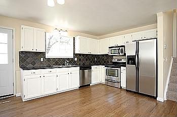 Kitchen with granite counters and stainless appliances