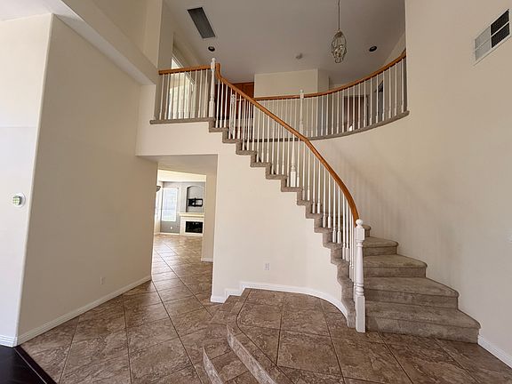 Stairs up to second floor landing.