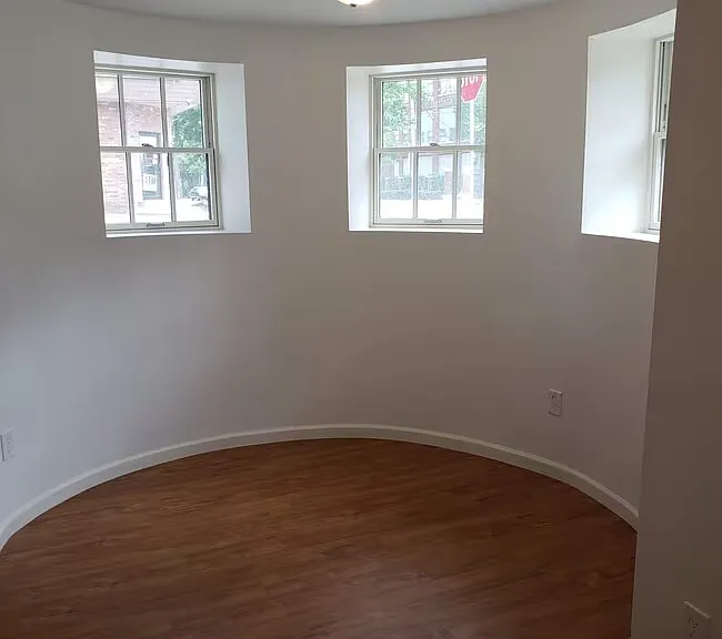 Living room with four windows.