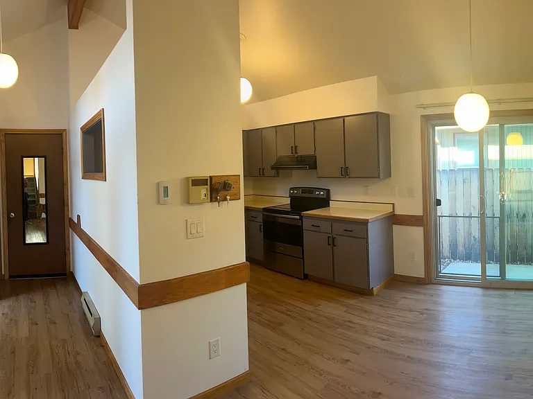 Kitchen/dining area. Sliding door to backyard.