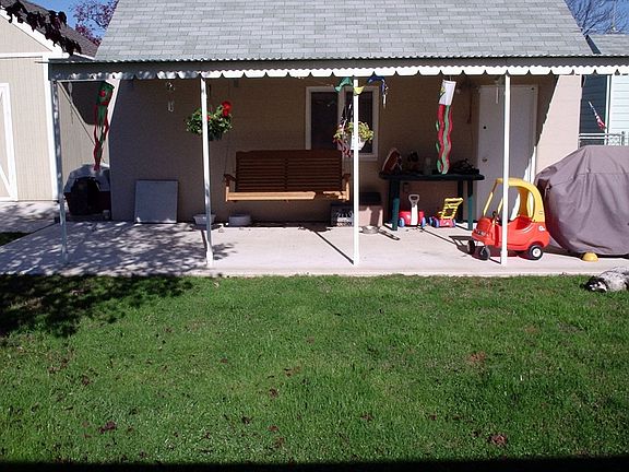 garage with awning with swing 