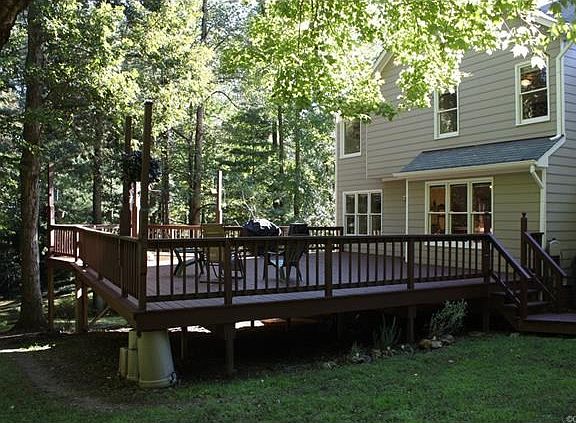 Rear view of house and deck.