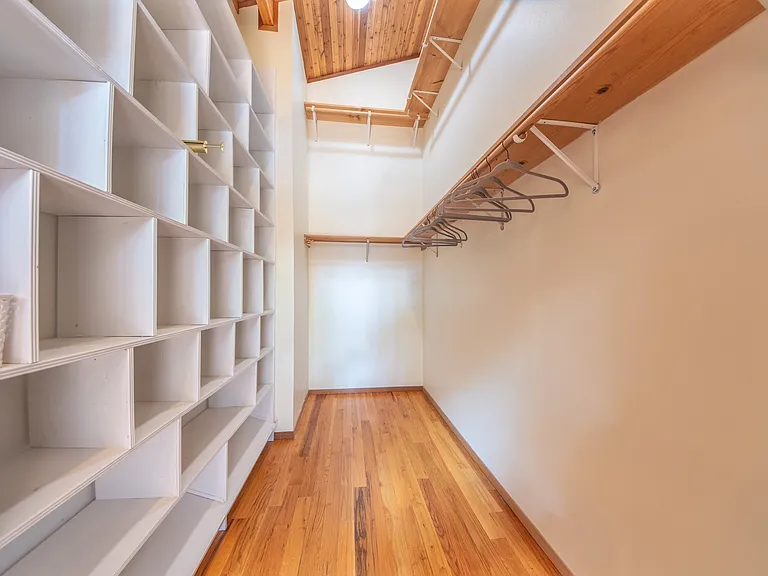 Large walk in closet in master bedroom.