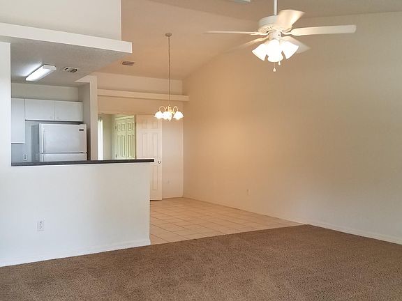 Open plan, living area, dining area and kitchen. Double doors to bonus room and laundry.