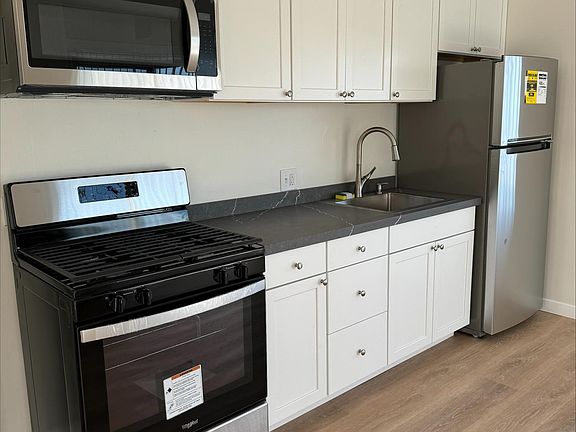 Kitchen appliances and cabinets all new!