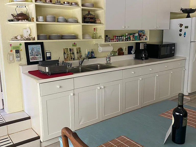 Complete kitchen, range, refrigerator, micro wave.
