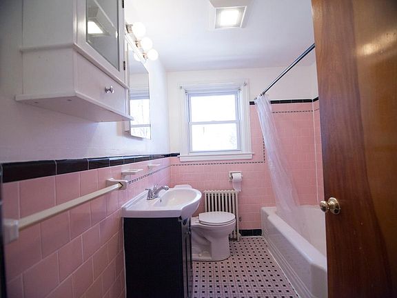 Full tile bathroom with tub + shower, brand new non-slip tile floor (not visible in this photo)