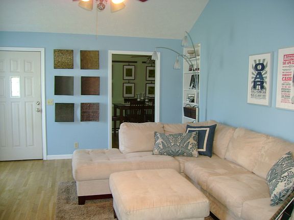 Large living room with vaulted ceiling and great daylight